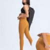wholesale quick dry spandex women fitness leggings with phone pocket manufacturers